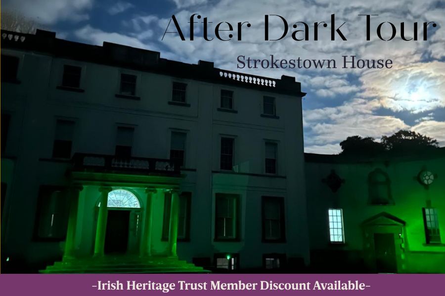 Strokestown House at night with green lighting.