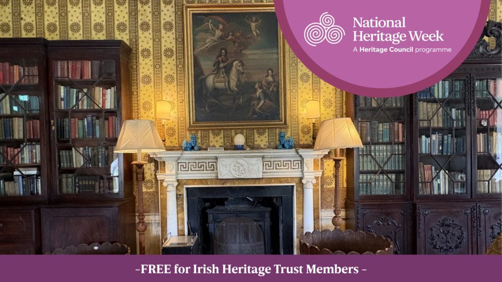 Strokestown Park House library showing the wallpaper featuring Heritage Week logo and text saying Free for Irish Heritage Trust Members